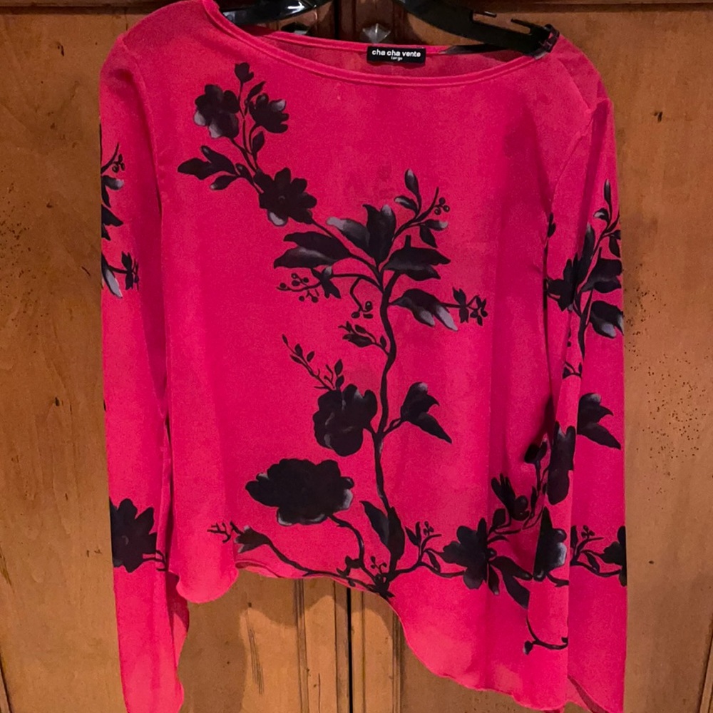 Red with black flowers top.